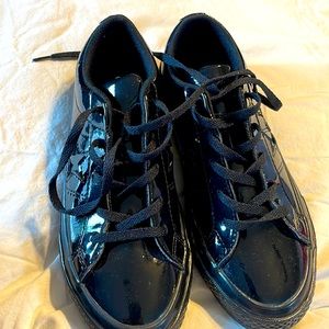 Girls black patent leather converse all stars size 2.5. Never worn.